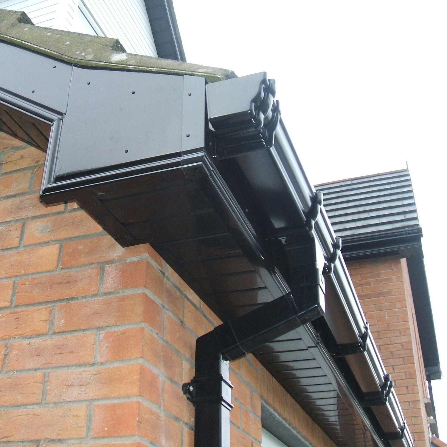 Black capping board fitted on house 